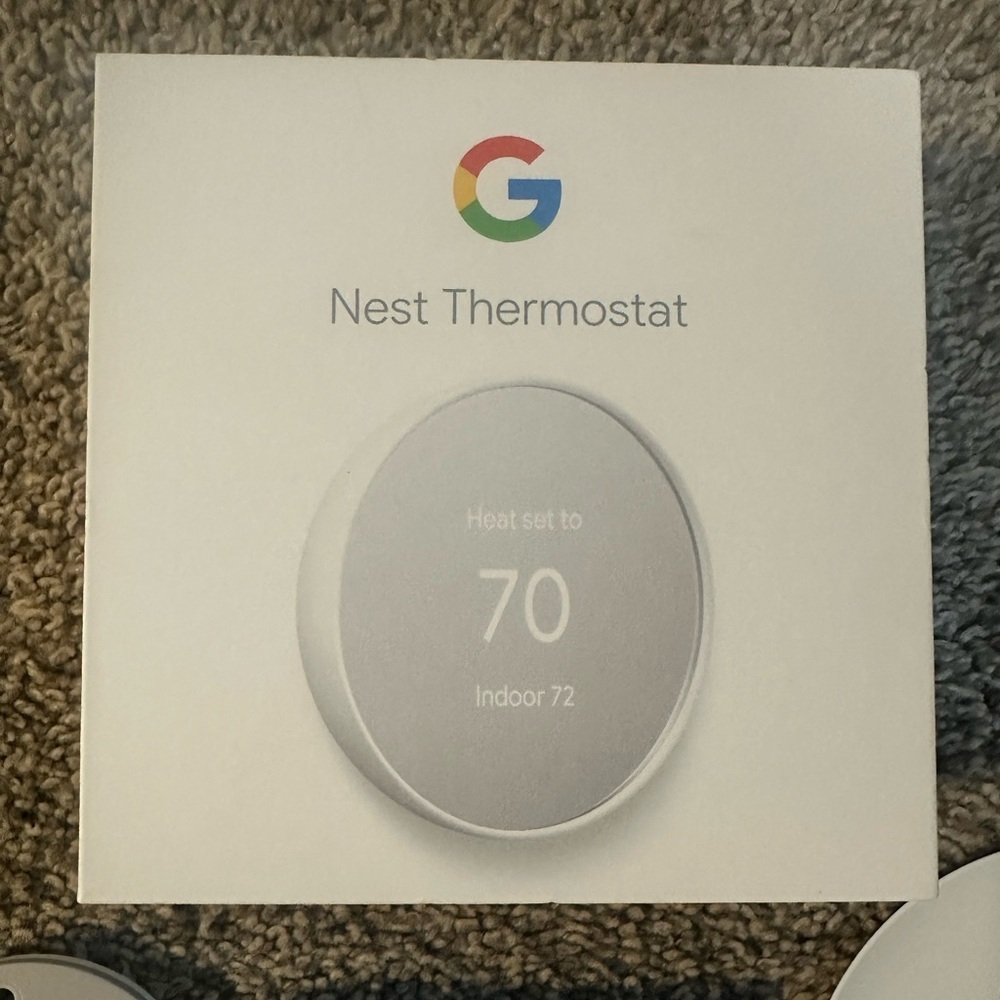 Google Nest Thermostat in Snow